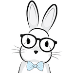 A headshot of a rabbit wearing glasses and a light blue bowtie.