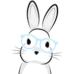 A headshot of a rabbit wearing light blue glasses.