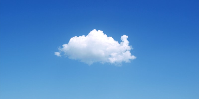 Image of one white cloud in a blue sky.